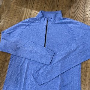 Lulu Lemon 1/4 Zip Lt Blue in good condition.